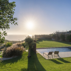 Mediterranean garden with heated pool and ocean views