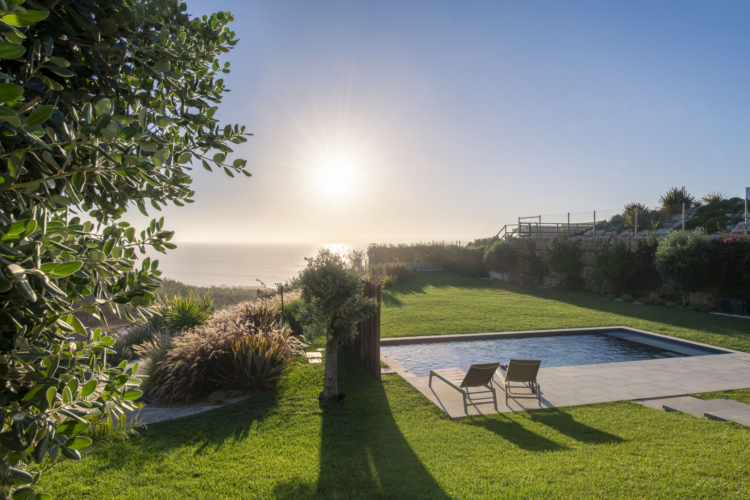 Mediterranean garden with heated pool and ocean views