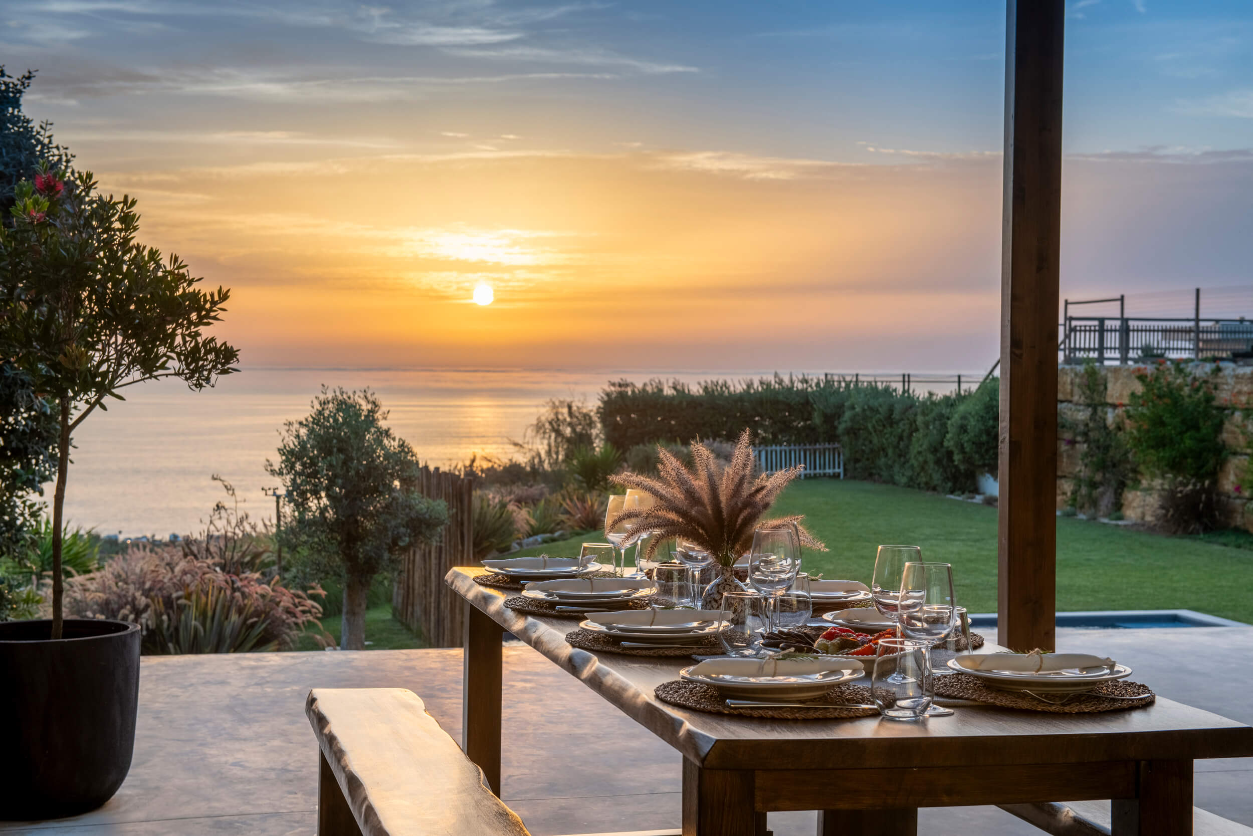Ocean view dining on the deck, sunset and Mediterranean garden views