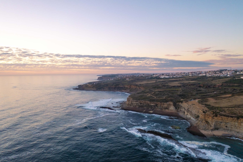 Aerial view of coastline at sunset looking north towards Coxos point break